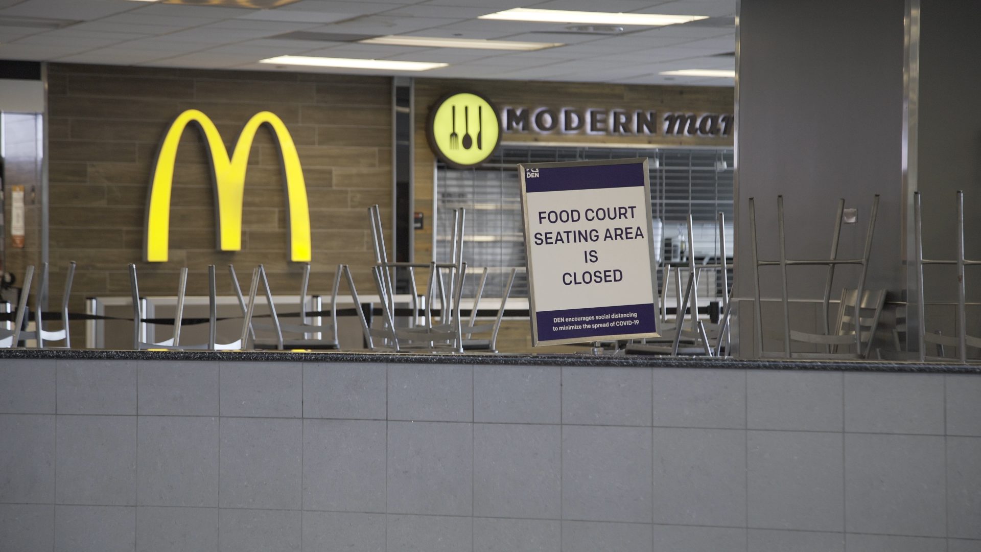 Screen grab from Sony A7rII of a closed seating area at Denver International Airport.